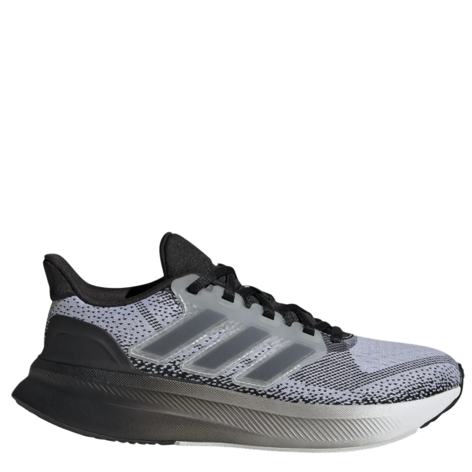 KIDS' UltraRun 5 low - cut running shoes running during a foggy day